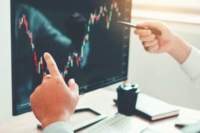 Trader analyzing SPX candlestick chart during the market open